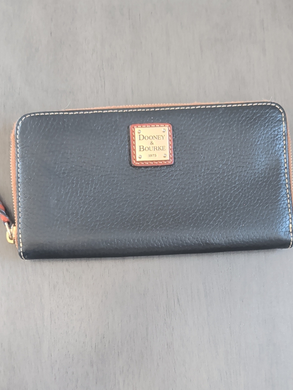 Dooney & Bourke Black Zip-Around Wallet.